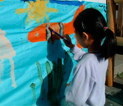 Picture of girl painting.